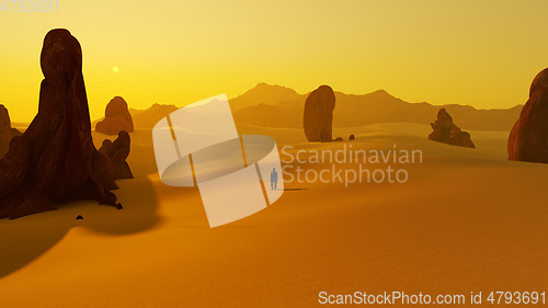 Image of lonely man in the dry sunset desert