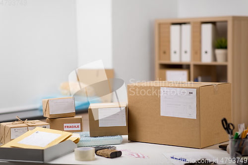 Image of parcel boxes and packing stuff at post office