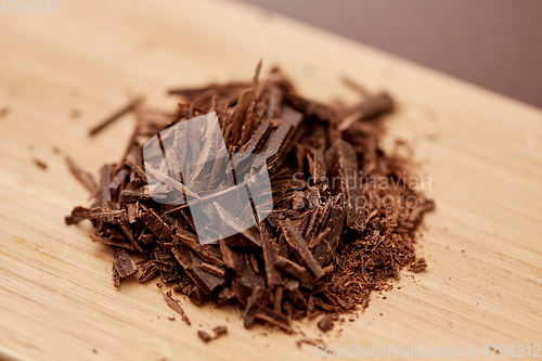 Image of chocolate chips on wooden board