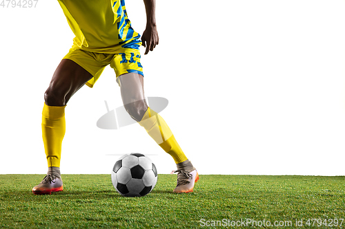 Image of Professional african football or soccer player isolated on white background