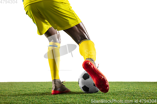Image of Professional african football or soccer player isolated on white background