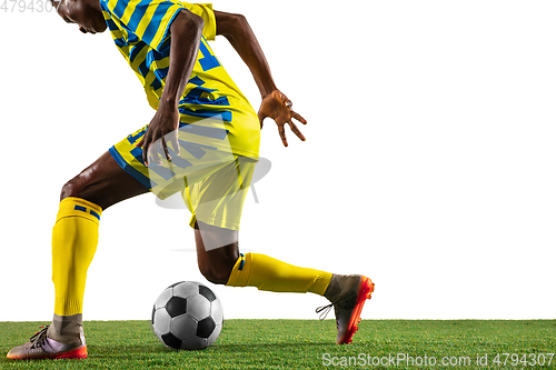 Image of Professional african football or soccer player isolated on white background