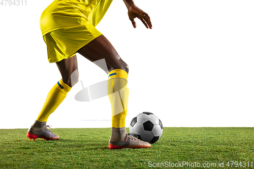 Image of Professional african football or soccer player isolated on white background