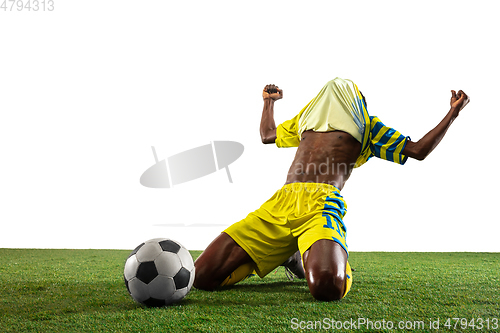 Image of Professional african football or soccer player isolated on white background