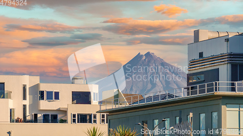 Image of Mt. Taranaki in New Zealand between houses