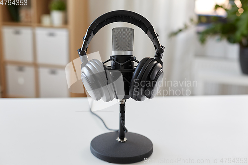 Image of headphones and microphone at home office