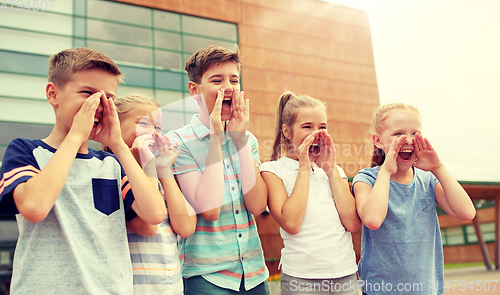 Image of group of happy elementary school students