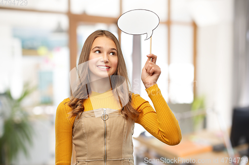 Image of teenage girl holding speech bubble over office