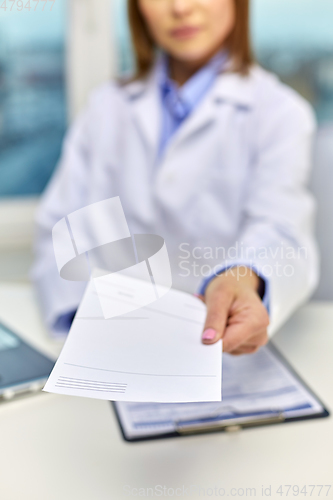 Image of close up of doctor with prescription at hospital