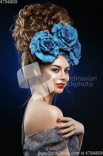 Image of girl with beautiful high curly hairstyle