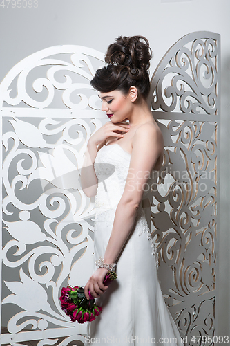 Image of beautiful girl in wedding gown