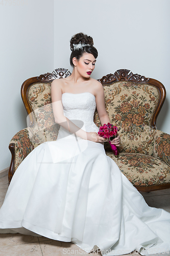 Image of beautiful girl in wedding gown