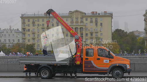 Image of MOSCOW - OCTOBER 14: Workers load the fence into the truck on October 14, 2017 in Moscow, Russia