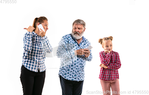 Image of Family members arguing with one another on white studio background.