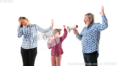 Image of Family members arguing with one another on white studio background.