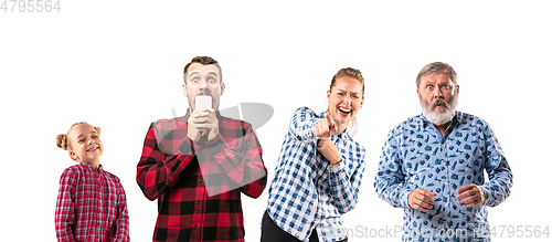 Image of Family members on white studio background.