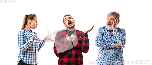 Image of Family members arguing with one another on white studio background.