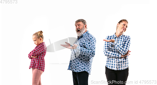 Image of Family members arguing with one another on white studio background.
