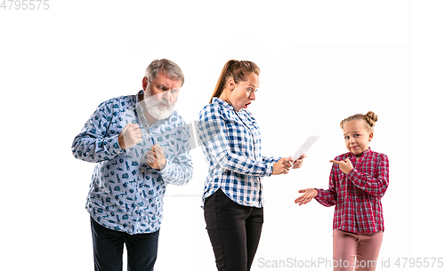 Image of Family members arguing with one another on white studio background.