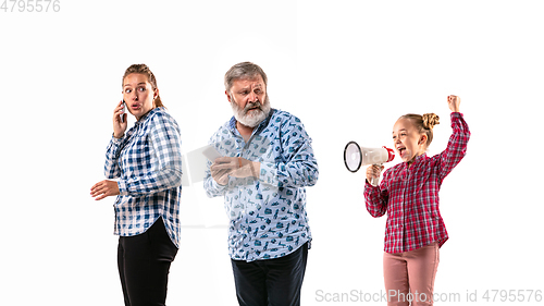 Image of Family members arguing with one another on white studio background.