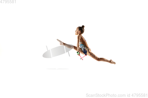 Image of Little flexible female gymnast isolated on white studio background