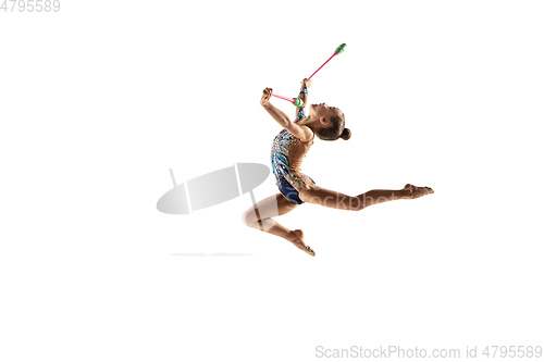 Image of Little flexible female gymnast isolated on white studio background