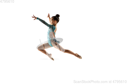Image of Little flexible female gymnast isolated on white studio background