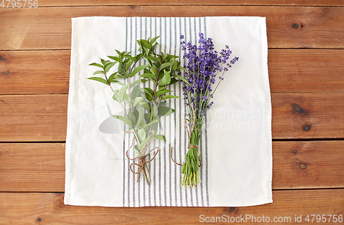 Image of greens, spices or medicinal herbs on towel