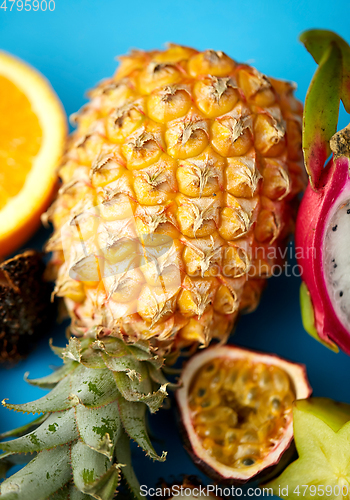Image of close up of pineapple with other exotic fruits