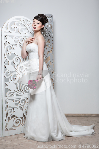 Image of beautiful girl in wedding gown