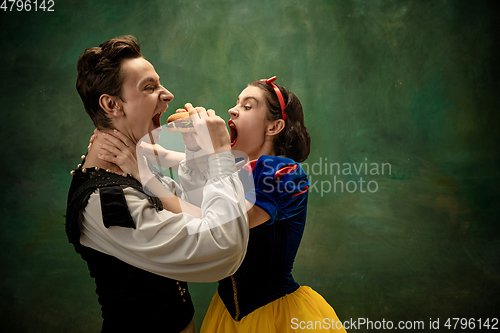 Image of Young ballet dancers as a Snow White\'s characters in forest, modern tales