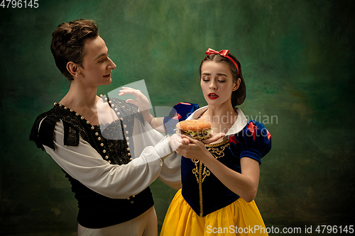 Image of Young ballet dancers as a Snow White\'s characters in forest, modern tales