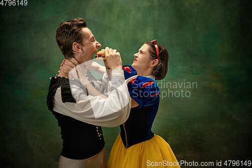 Image of Young ballet dancers as a Snow White\'s characters in forest, modern tales