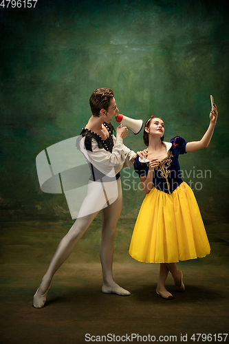 Image of Young ballet dancers as a Snow White\'s characters in forest modern tales