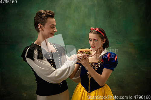 Image of Young ballet dancers as a Snow White\'s characters in forest, modern tales