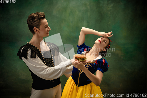 Image of Young ballet dancers as a Snow White\'s characters in forest, modern tales