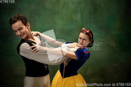 Image of Young ballet dancers as a Snow White\'s characters in forest modern tales