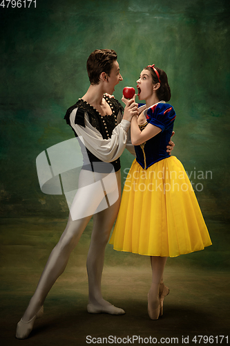 Image of Young ballet dancers as a Snow White\'s characters in forest modern tales