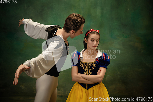 Image of Young ballet dancers as a Snow White\'s characters in forest modern tales