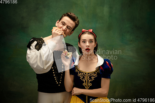 Image of Young ballet dancers as a Snow White\'s characters in forest modern tales