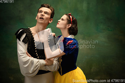 Image of Young ballet dancers as a Snow White\'s characters in forest modern tales