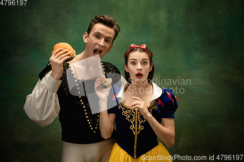 Image of Young ballet dancers as a Snow White\'s characters in forest modern tales