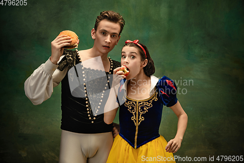 Image of Young ballet dancers as a Snow White\'s characters in forest modern tales