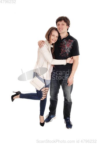 Image of Beautiful young couple hugging