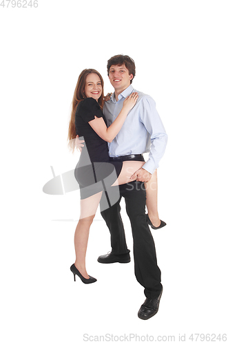 Image of Young couple standing dancing