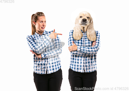 Image of Young handsome woman arguing with herself as a dog on white studio background.