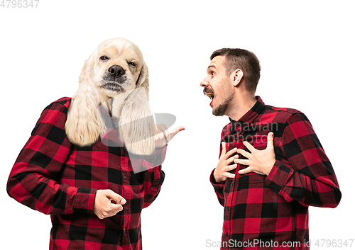 Image of Man arguing with himself as a dog on white studio background.