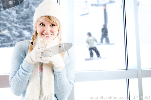 Image of Caucasian girl drinking coffee