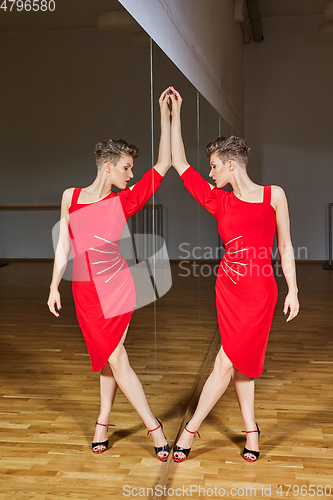 Image of tango dancer woman excersizing in dance studio room