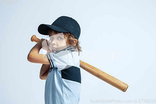 Image of Pretty young boy in casual clothes on white studio background